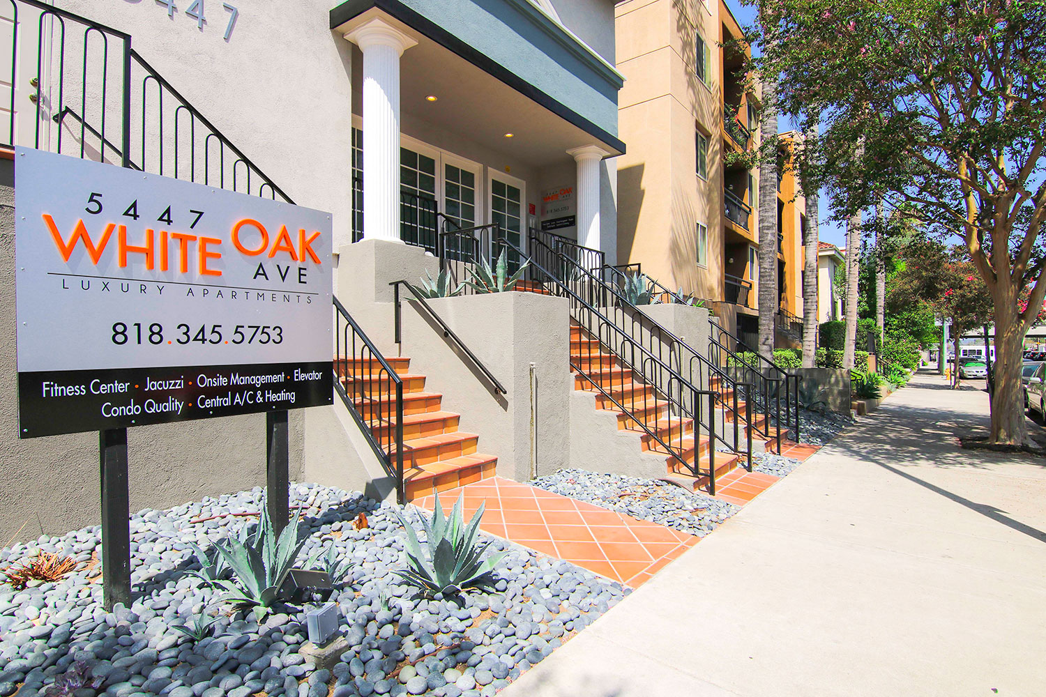Entrance to Chateau Encino including drought tolerant landscaping.