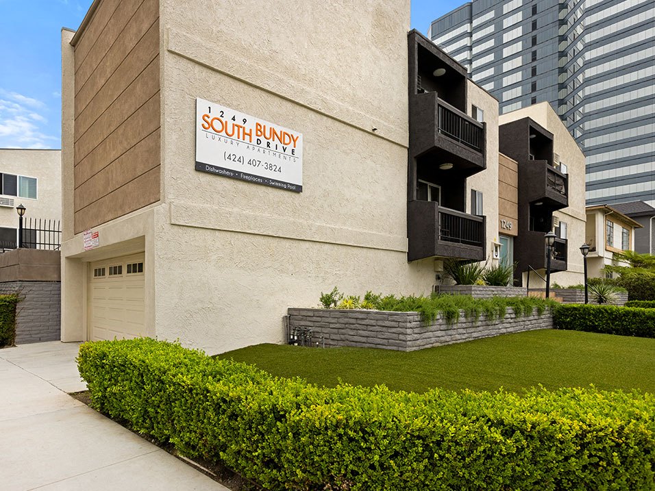 Front lawn and entrance of 1249 South Bundy with visible garage.