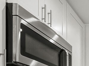 Brand new kitchen cabinets, back splash, quartz stone counter tops, and stainless steel appliances with fridge!