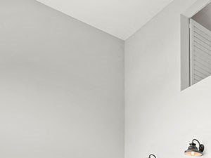 View of private stairs up to overhead loft.