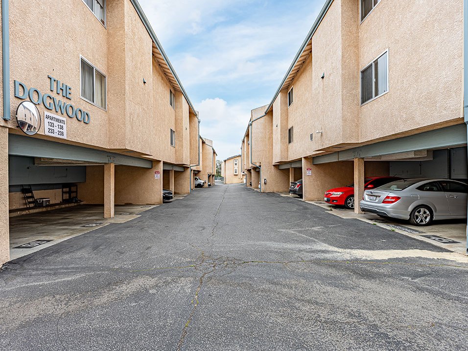 Gateed and assigned tuck-under parking spots at Olive View Gardens.