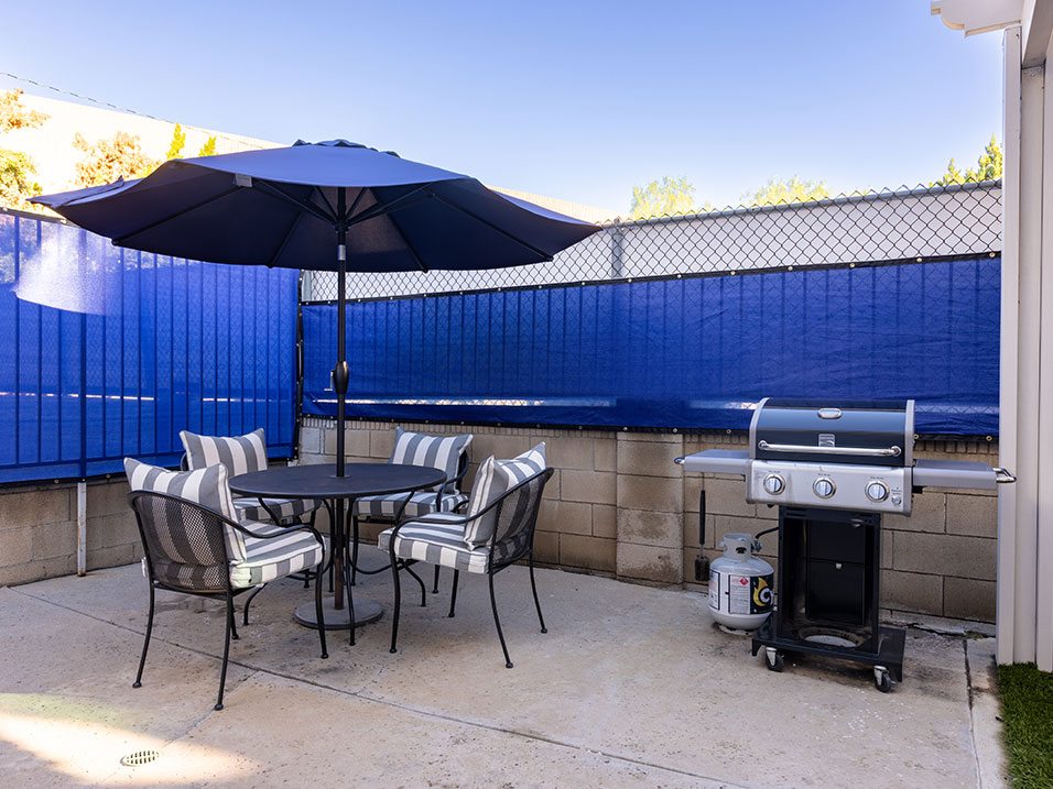 Additional outdoor seating and grilling area.