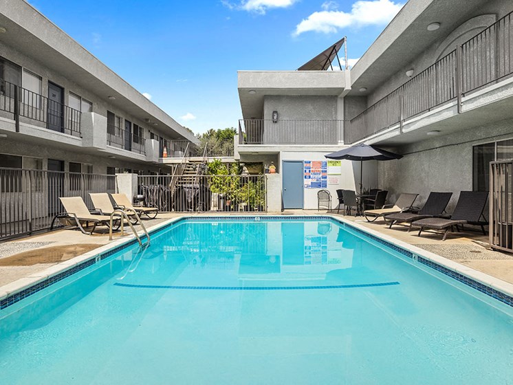 One of two large gated pools and lounging area.