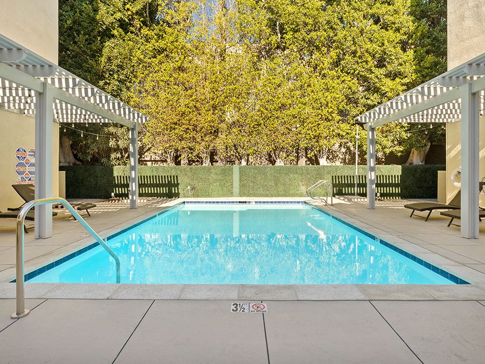 Courtyard pool at Palms Court Apartments