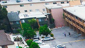 Aerial drone view of roof showcasing solar panels for a low carbon footprint.