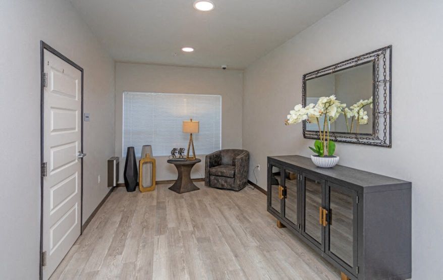 Common Area with Chair and Decor
