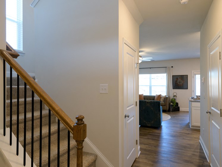 model entryway with staircase at Brighton Townhomes, Acworth, 30102