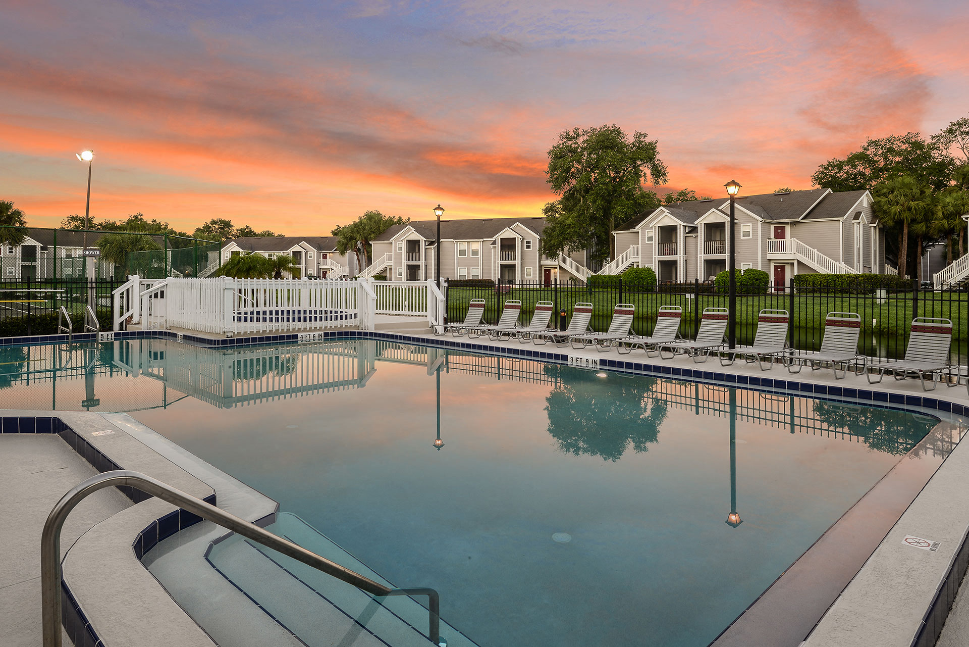 Colonial Pointe Apartments Orlando Lake and Buildings at Sunset 3