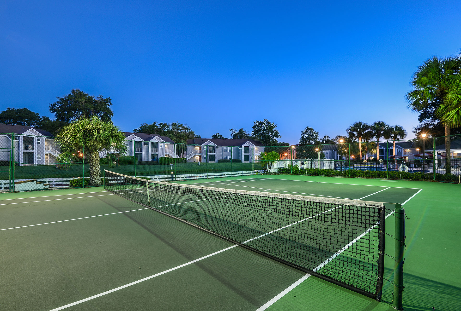 Colonial Pointe Apartments Orlando Tennis Court at Night