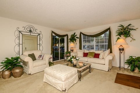 Hunters Glen Apartments Sarasota Florida Living Room with Couch and Loveseat with Ottoman