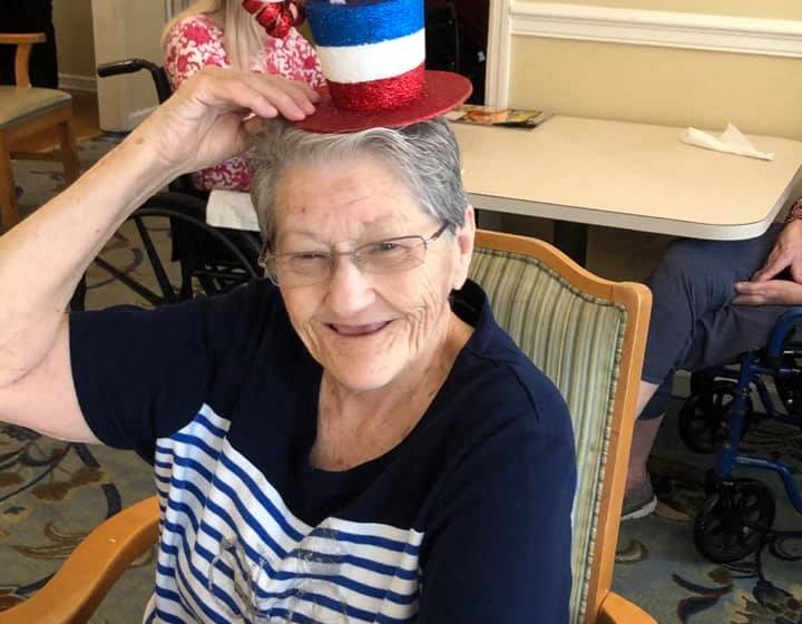 Senior Poses With The Hat at Savannah Court of Milledgeville, Georgia, 31061