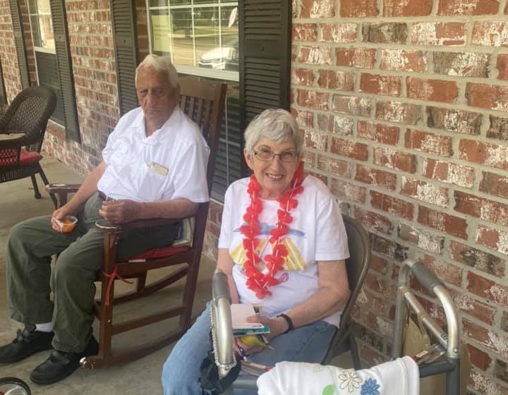 Seniors Sitting Outdoors at Savannah Court of Bastrop, Bastrop, LA, 71220
