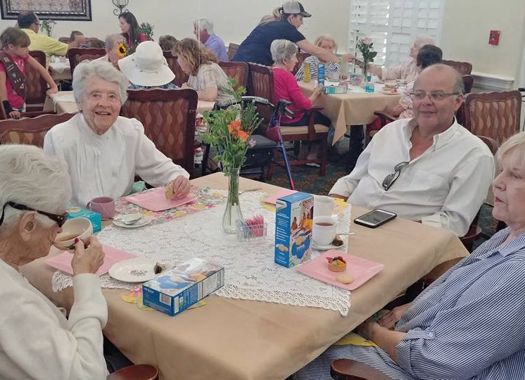 Old people enjoying sitting at Savannah Grand of Amelia Island, Florida