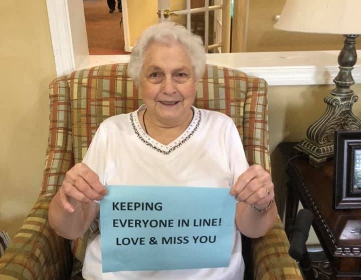 Senior Lady Carrying A Message Paper at Savannah Court of Lake Oconee, Greensboro, GA, 30642