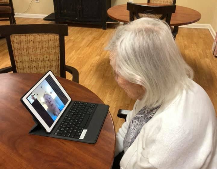 Senior Having A Video Call On Laptop at Savannah Court of Lake Oconee, Greensboro, Georgia