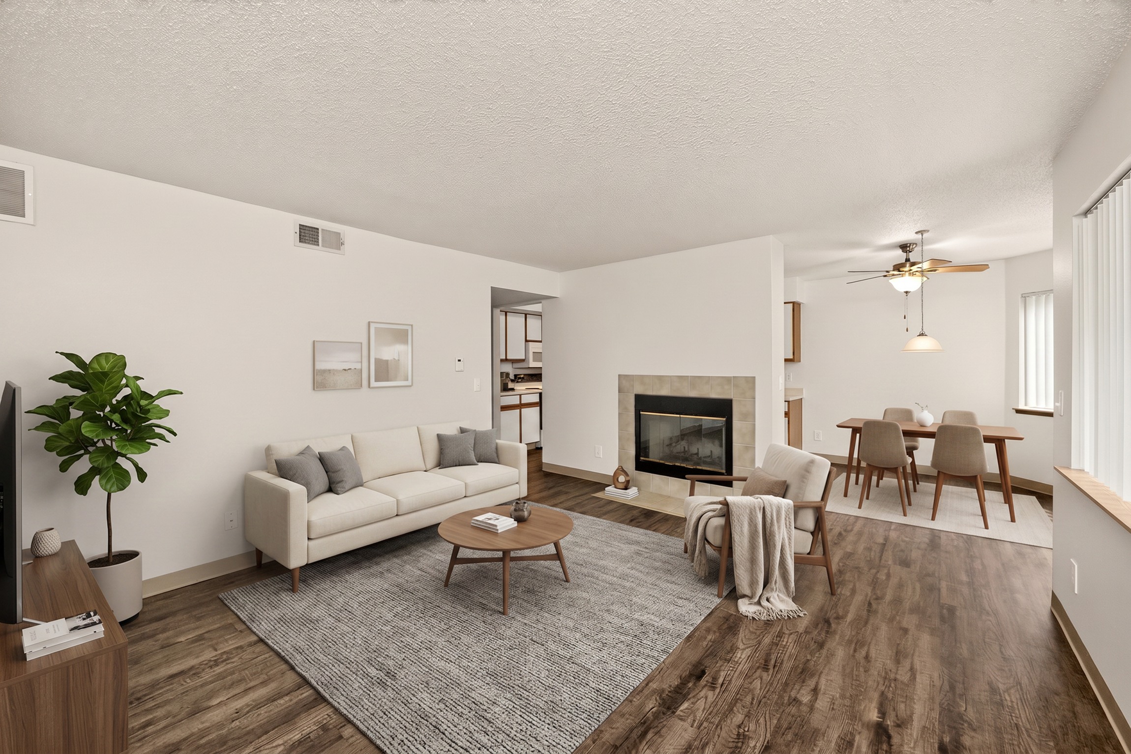 A living room with a fireplace and a couch.