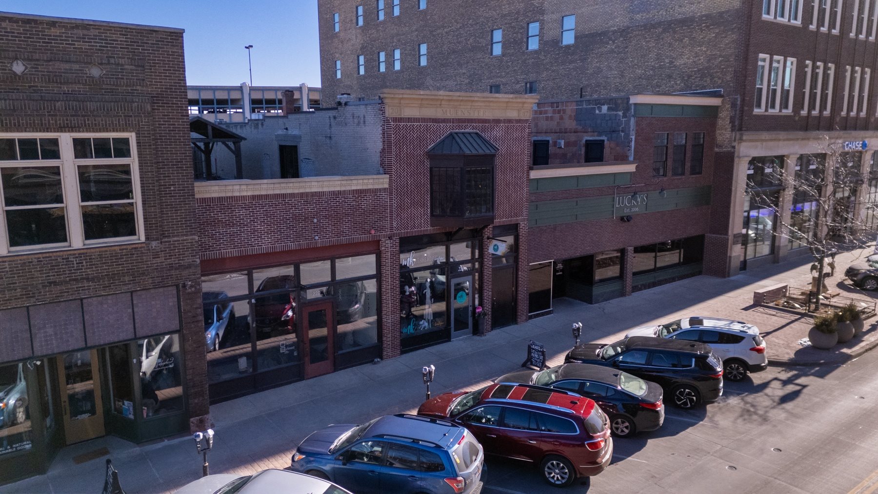 A parking lot with cars parked in it.