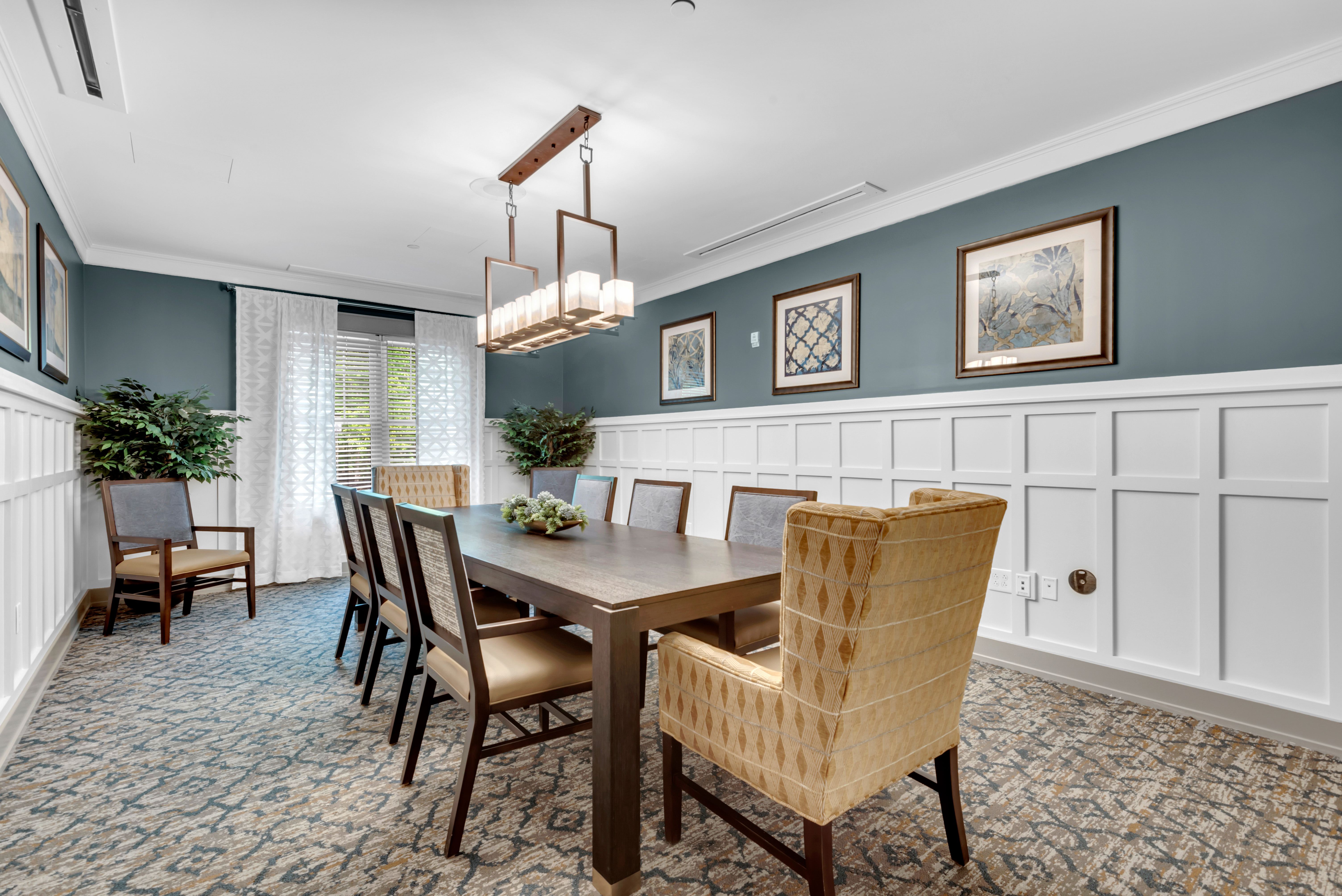 A dining room with a table set for four.at Spring Arbor of Severna Park, Severna Park, 21146