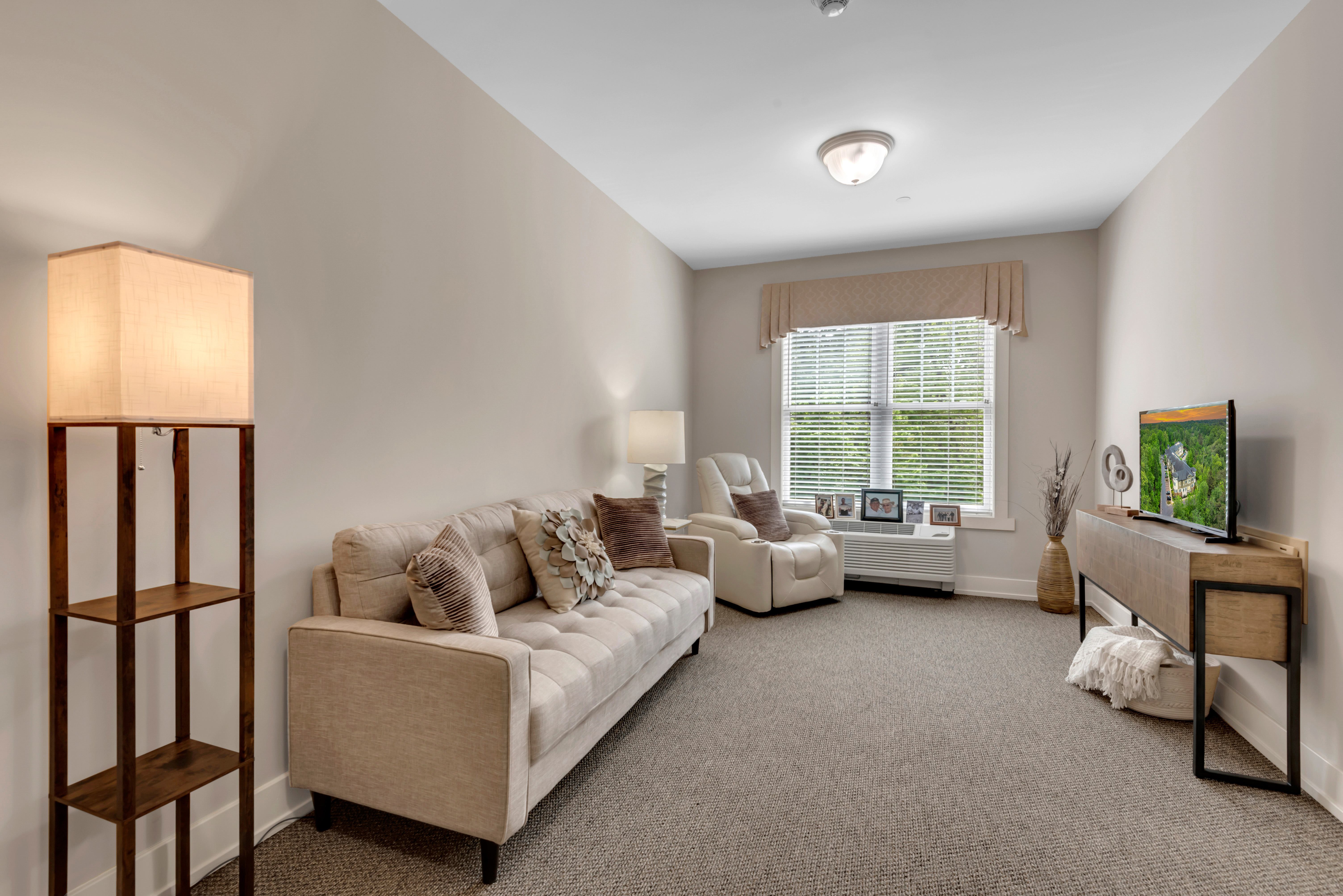 Carpeted Living Area at Spring Arbor of Severna Park, Maryland
