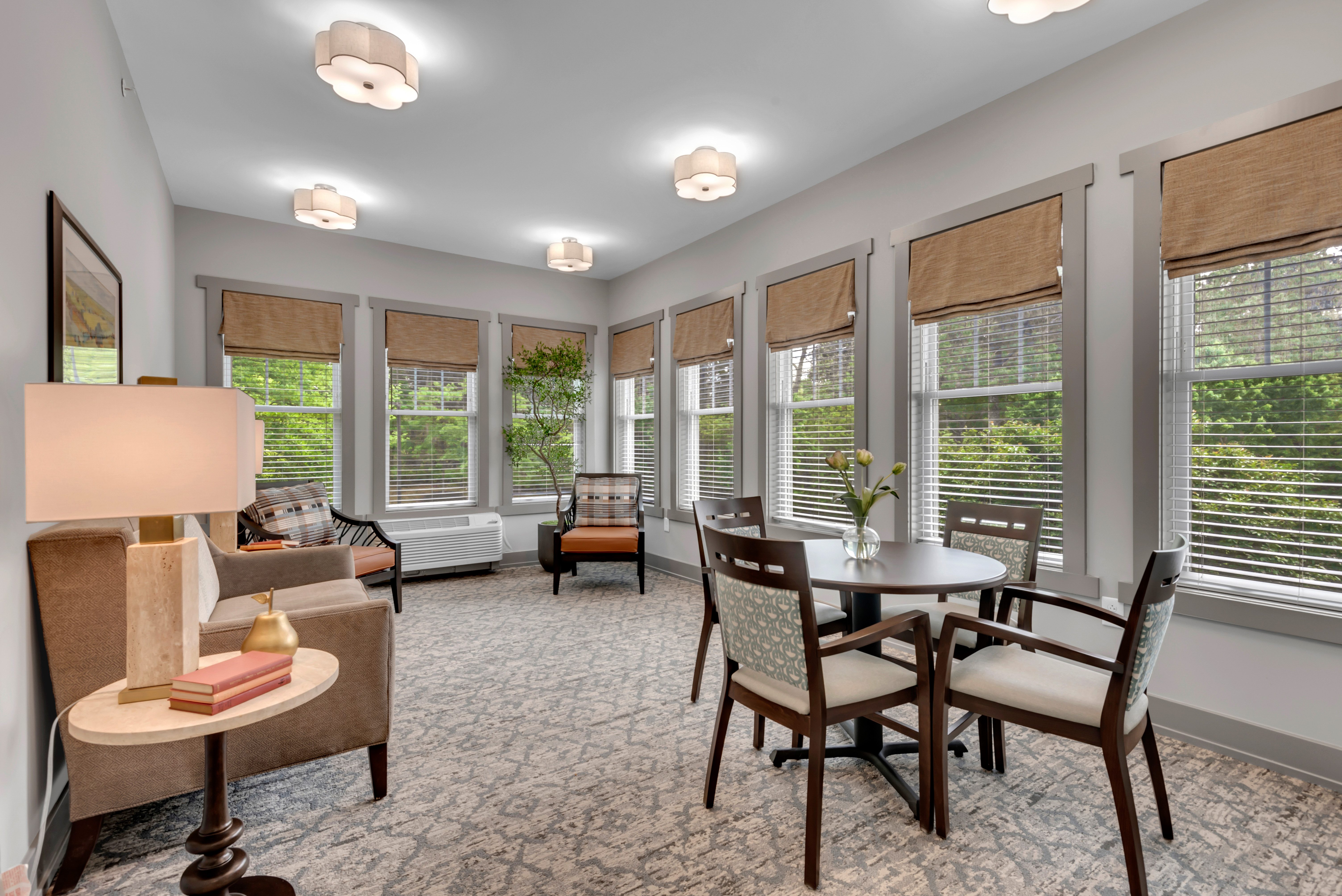 A well-lit room with a table and chairs.at Spring Arbor of Severna Park, Severna Park, 21146