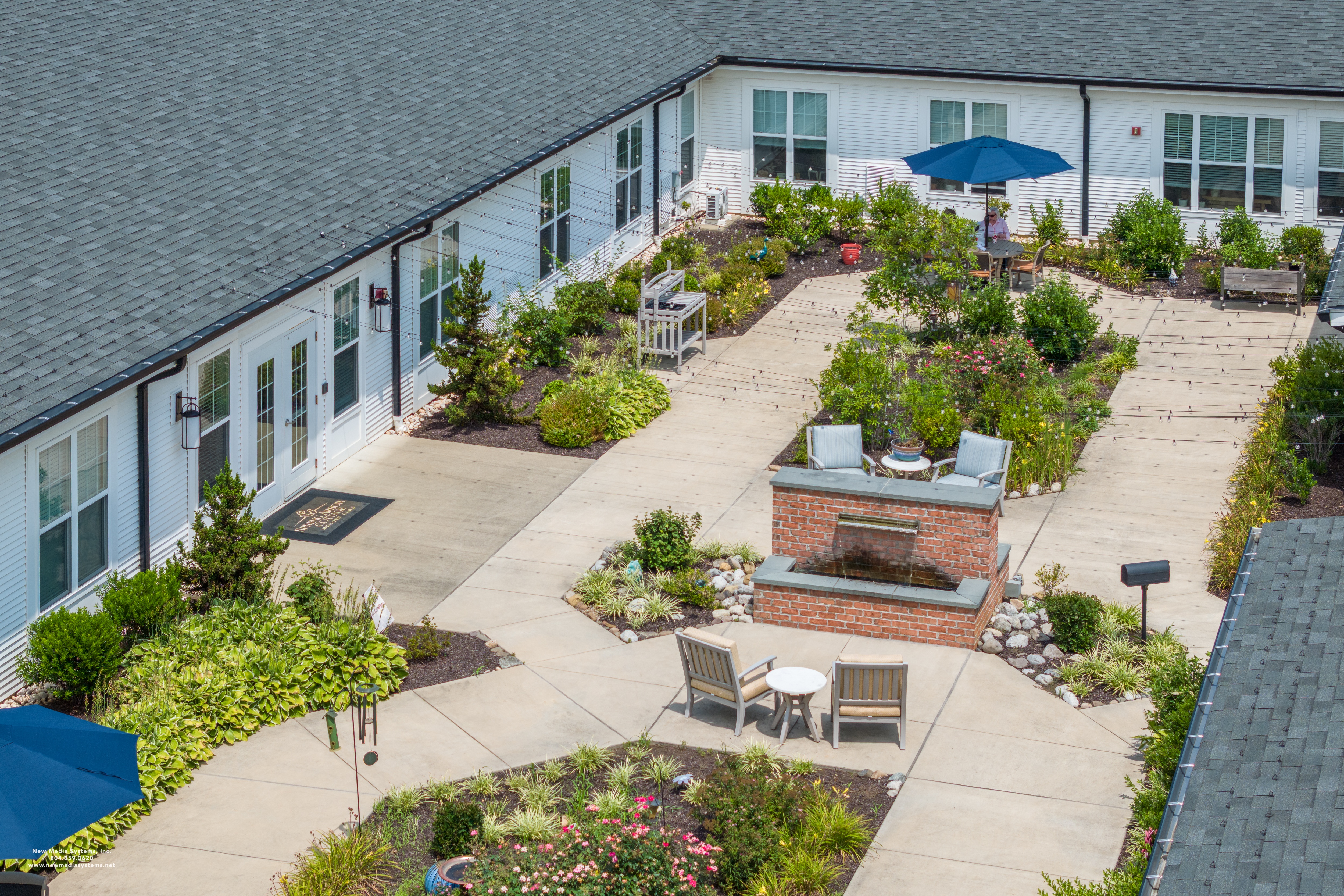 Patio with a Fireplace at Spring Arbor of Crofton, Maryland, 21114