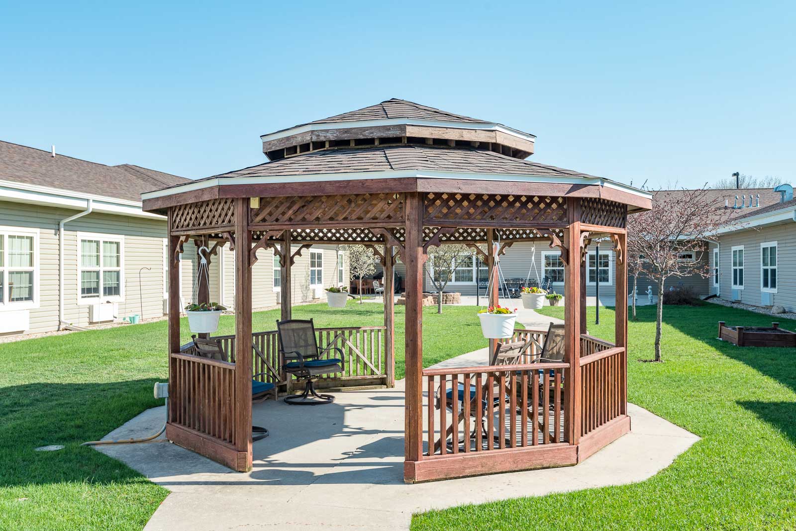 A wooden gazebo at Windsor Manor Webster City, Webster City, IA 50595