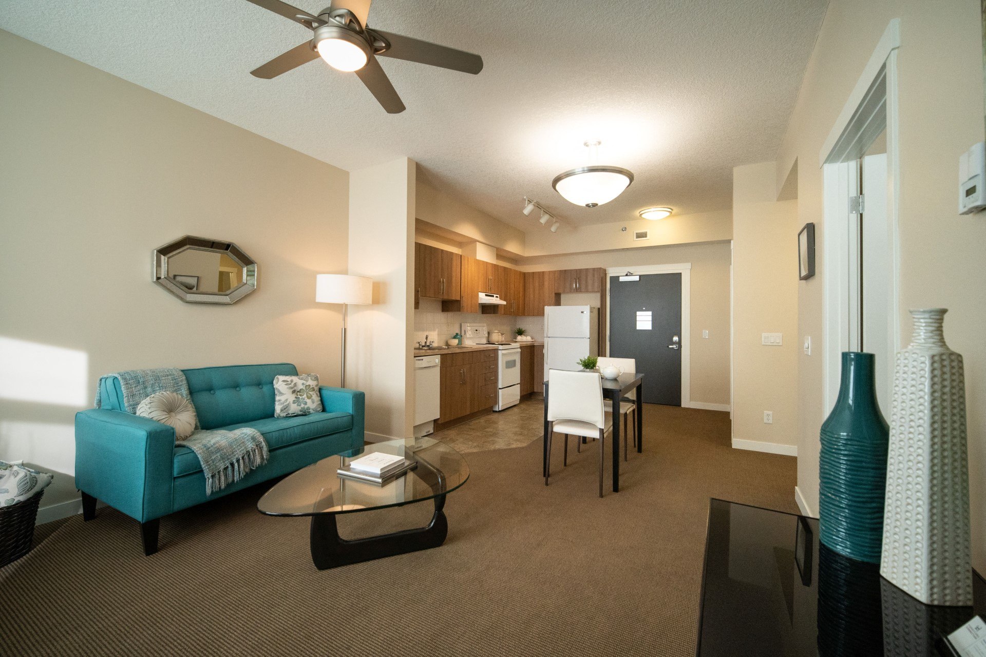 Spacious living room area in apartment at Willow Park on the Bow