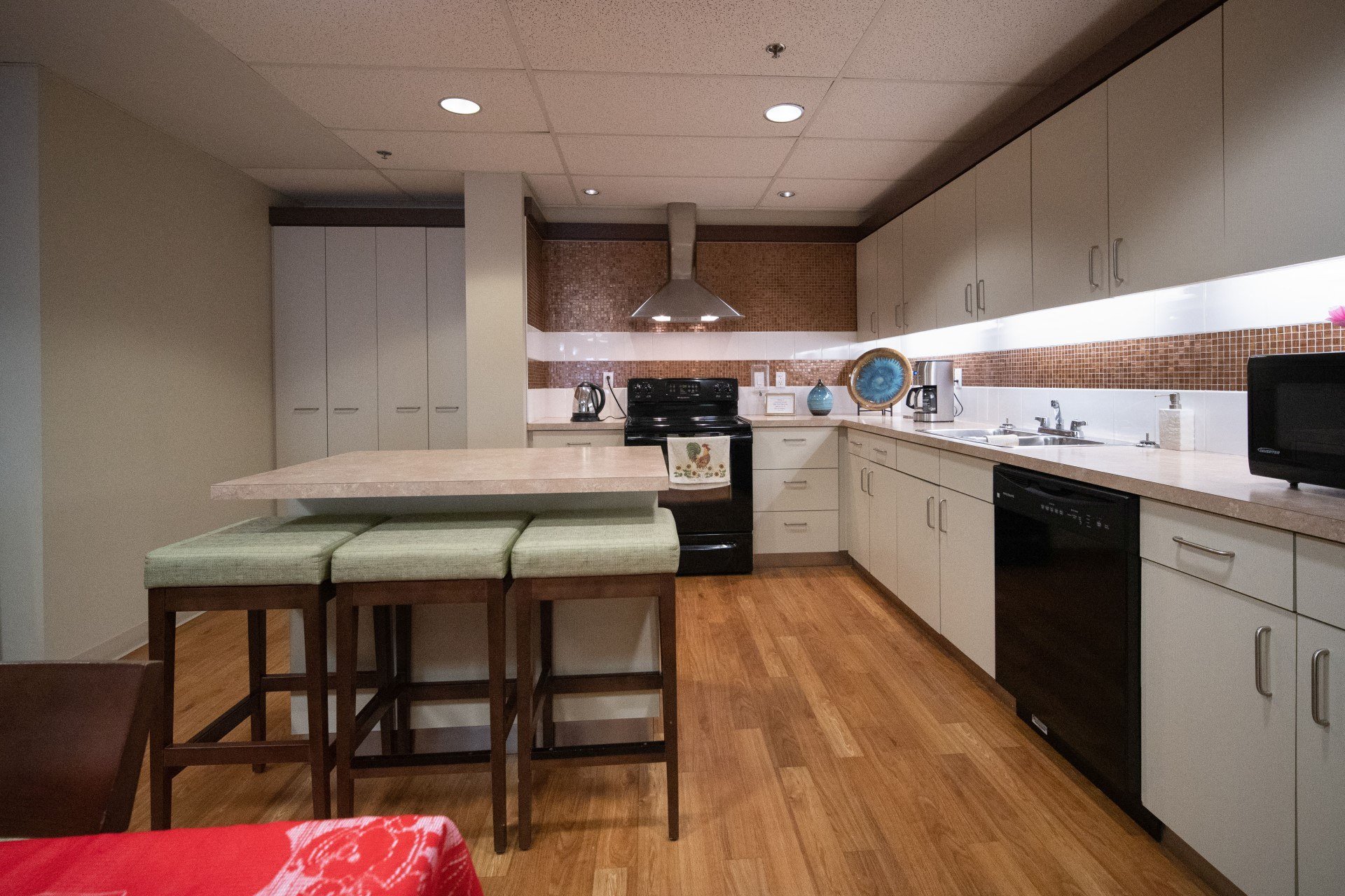 Shared common area with full kitchen at Willow Park on the Bow