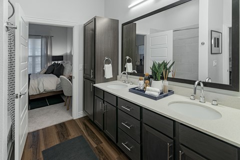 Spacious Bathroom Featuring Dual Vanities