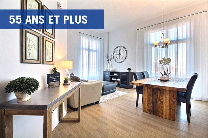 La Voile Boisbriand living area featuring large floor to ceiling windows in Boisbriand, QC