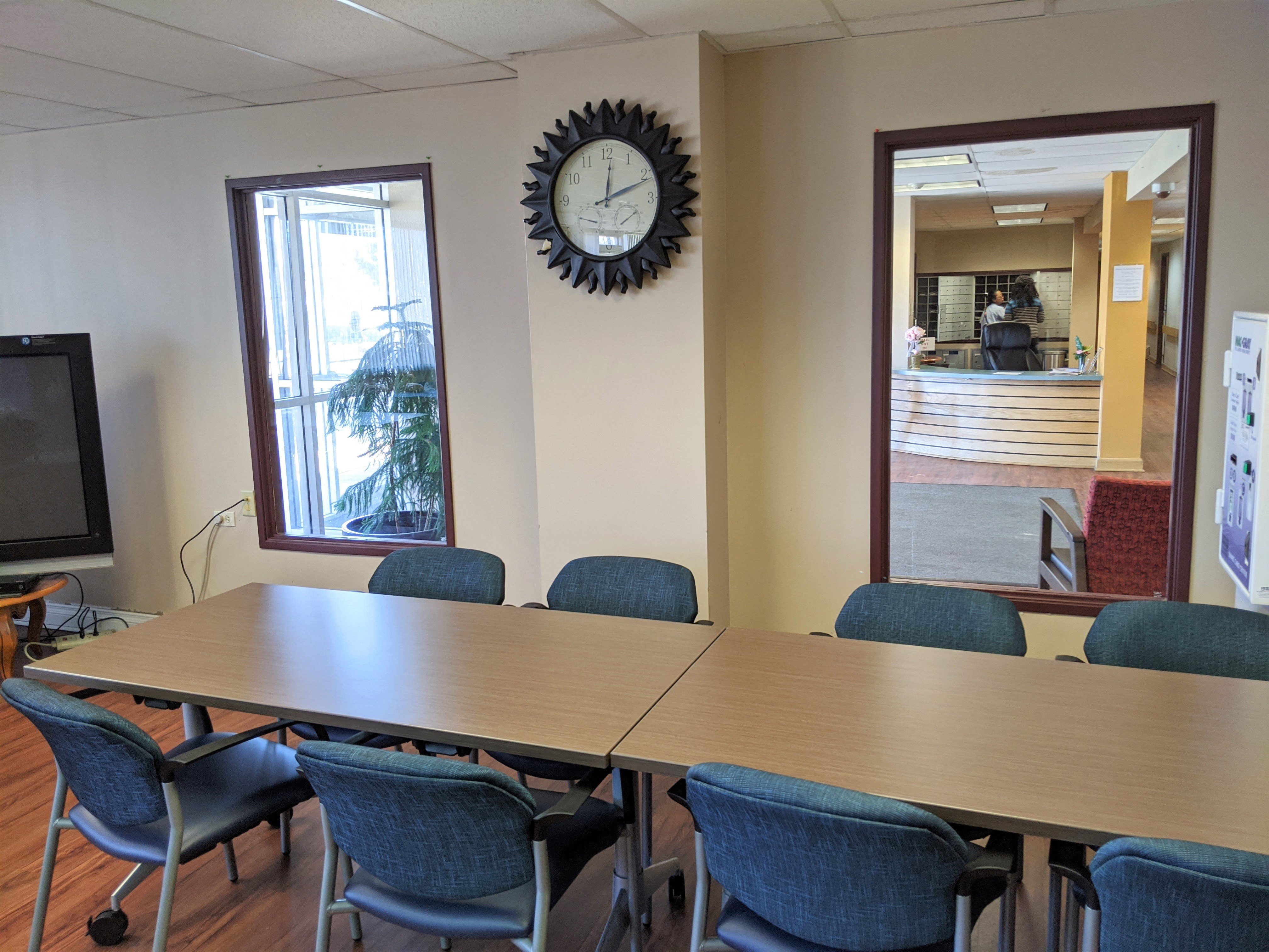 Tables and chairs in community room
