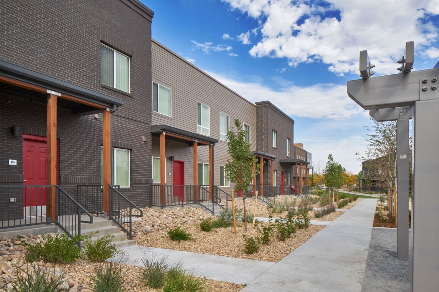 Exterior view of Exponent units, xeriscaped landscaping
