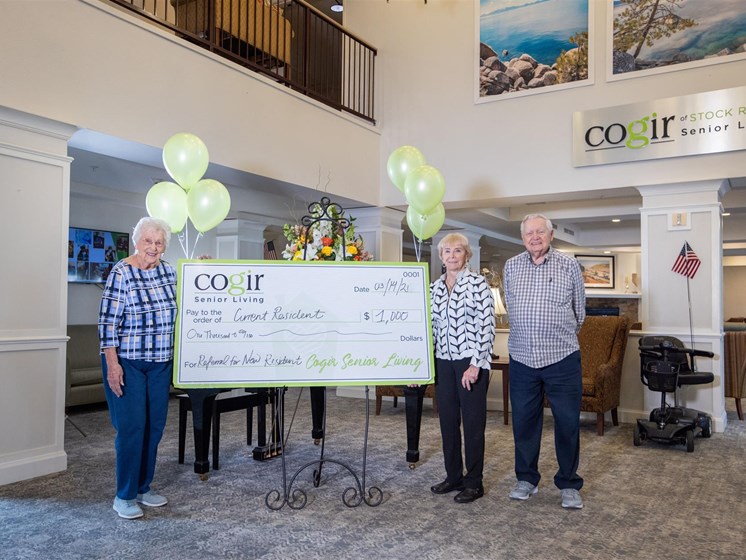 Senior's Posing With The Cheque at Cogir of Stock Ranch, Citrus Heights, 95621