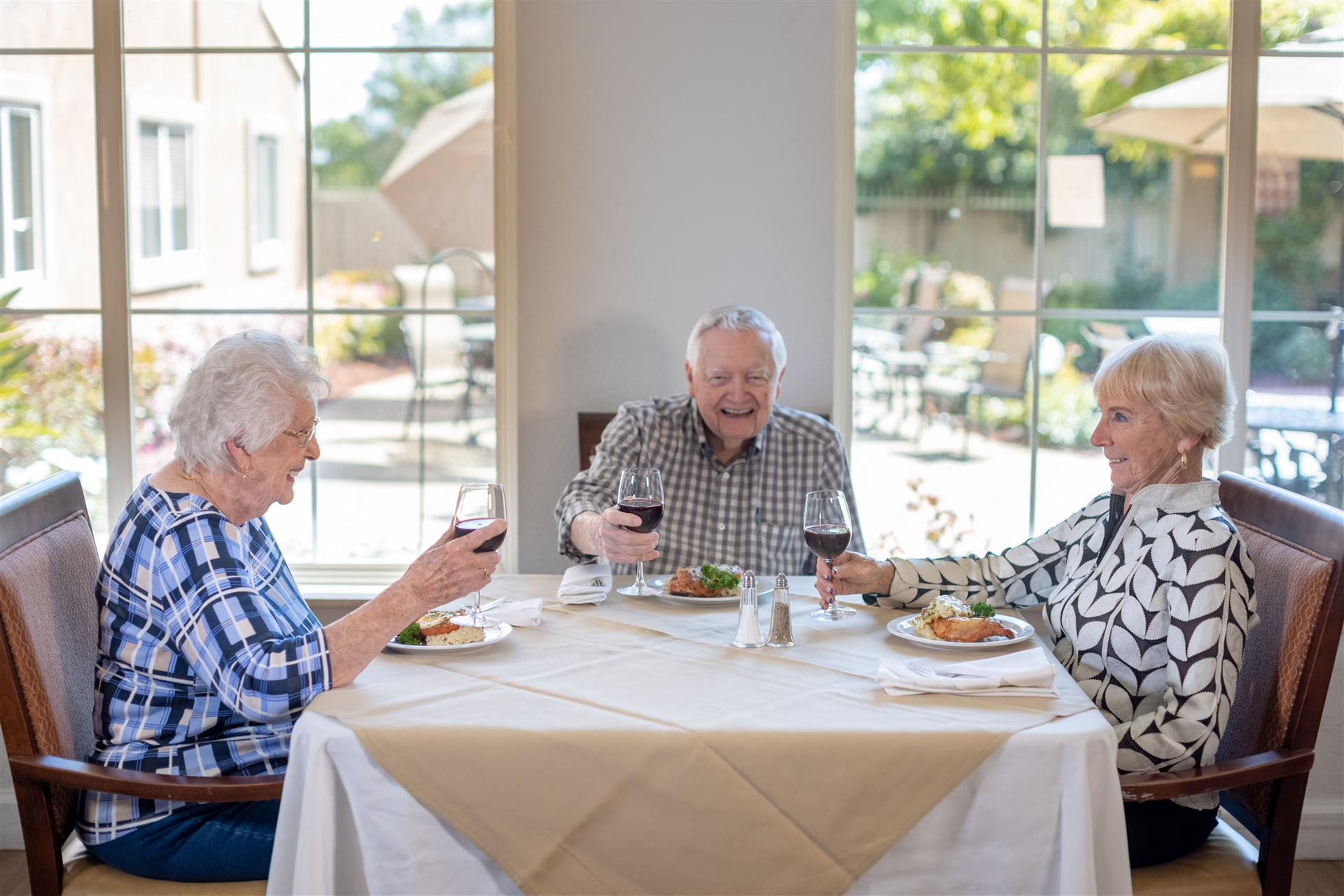 Seniors Having A Meal at Cogir of Stock Ranch, California