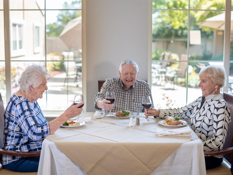 Seniors Having A Meal at Cogir of Stock Ranch, California
