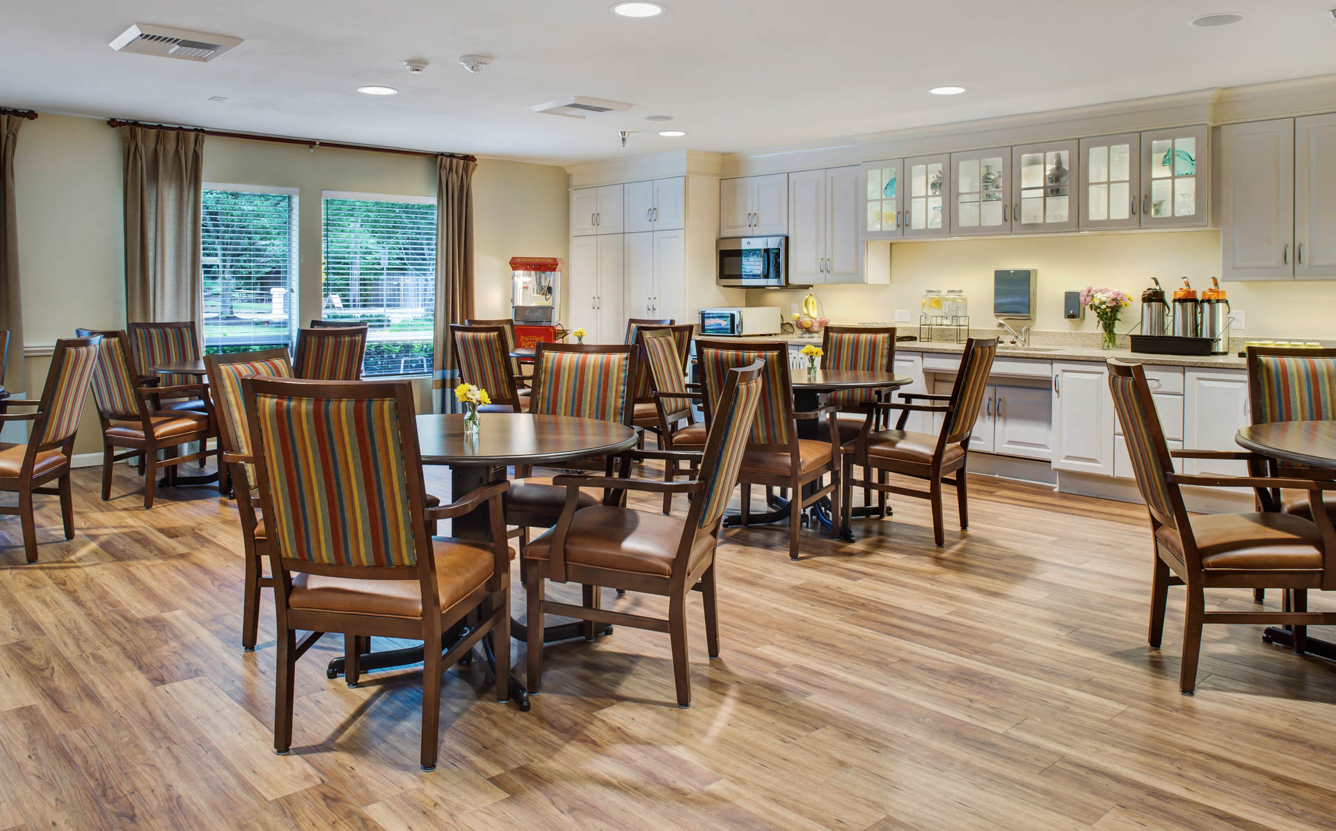 Dining room with tables and chairs at Cogir of San Rafael Memory Care, San Rafael