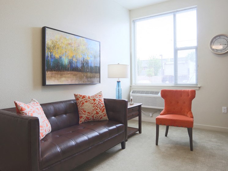 model living room at The Lofts by Cogir Senior Living, Vancouver, WA, 98662