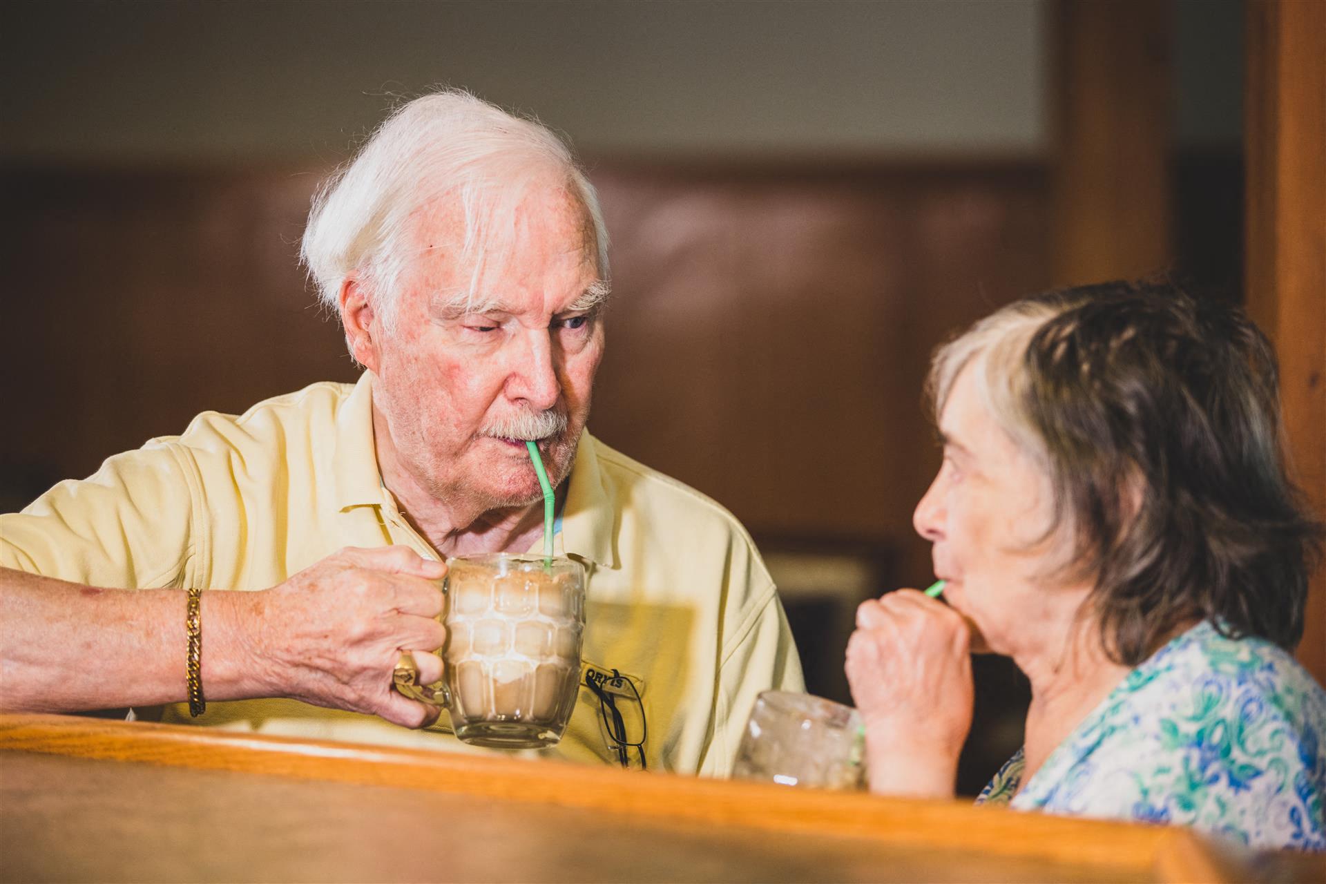 Elders having coffee at Cogir of Queen Anne, Washington