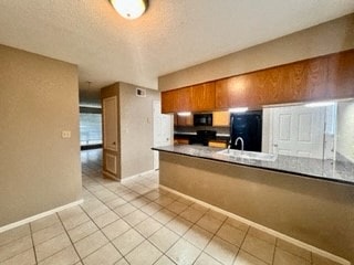 A photo of a unit's kitchen at Live Oak Townhouses