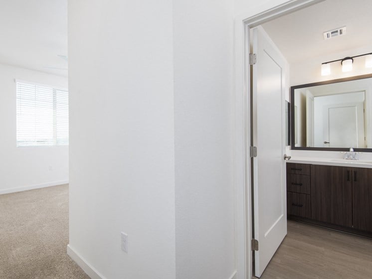 View Of Master Bathroom In Bedroom At The Club At Enclave Apartments In Chula Vista, CA