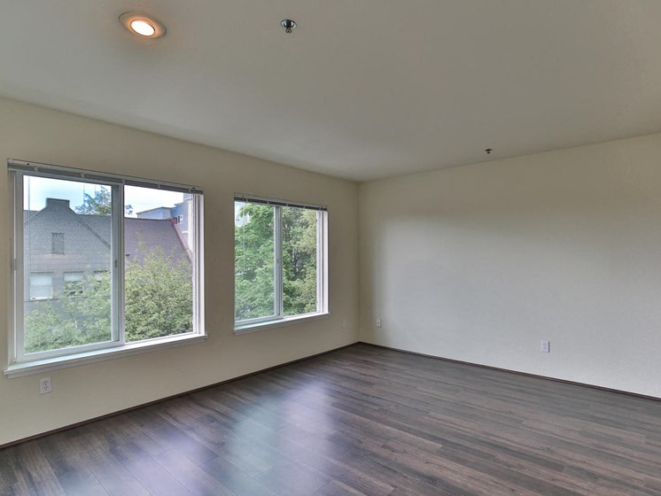 Living Room With Expansive Window at Charbonneau, Washington, 98101