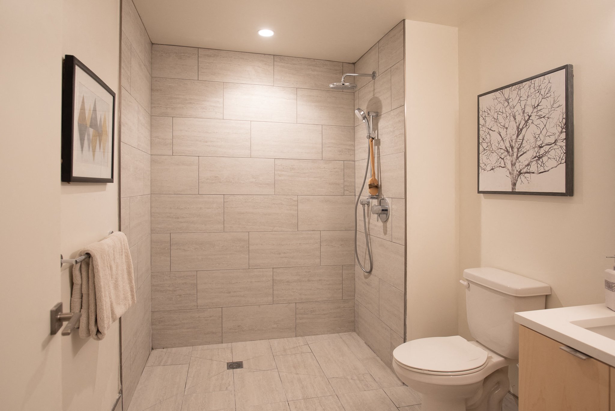 a small bathroom with a shower and a toilet