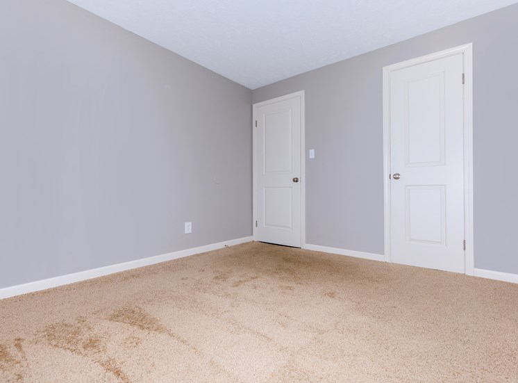 carpeted second bedroom