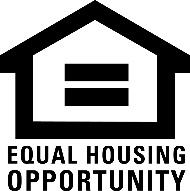 an equal housing opportunity symbol on the side of a house