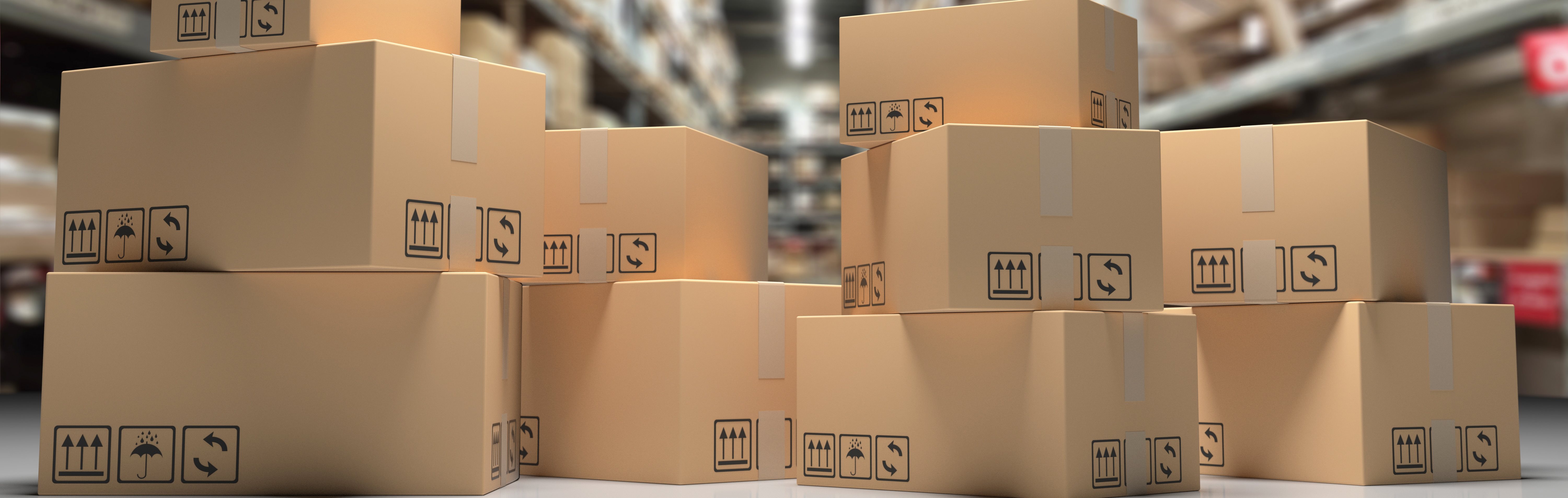 A stack of cardboard boxes with shipping labels on them.