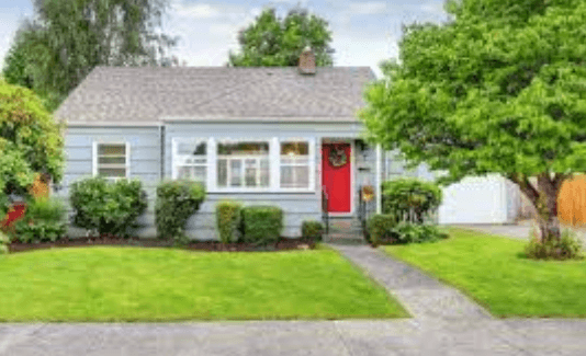 a blue house with a red door