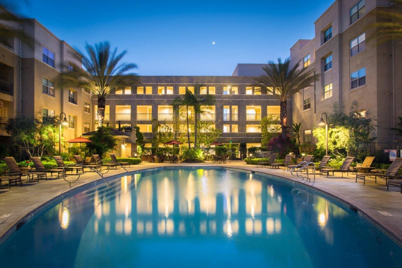 the swimming pool at night at the grove resort  spa