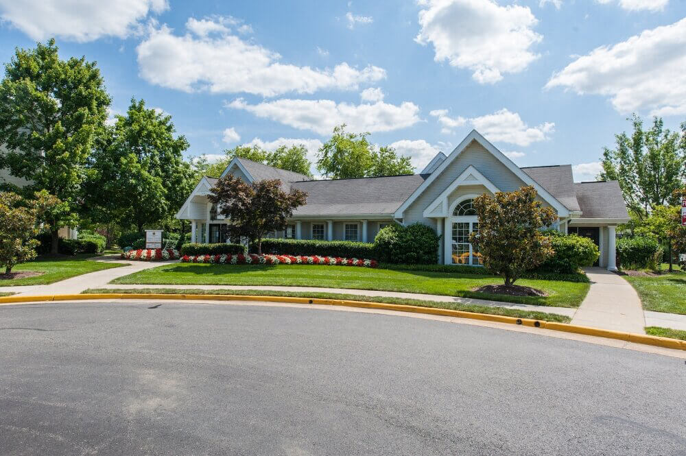 Coppermine Run neighborhoods feature open green spaces and mature foliage.