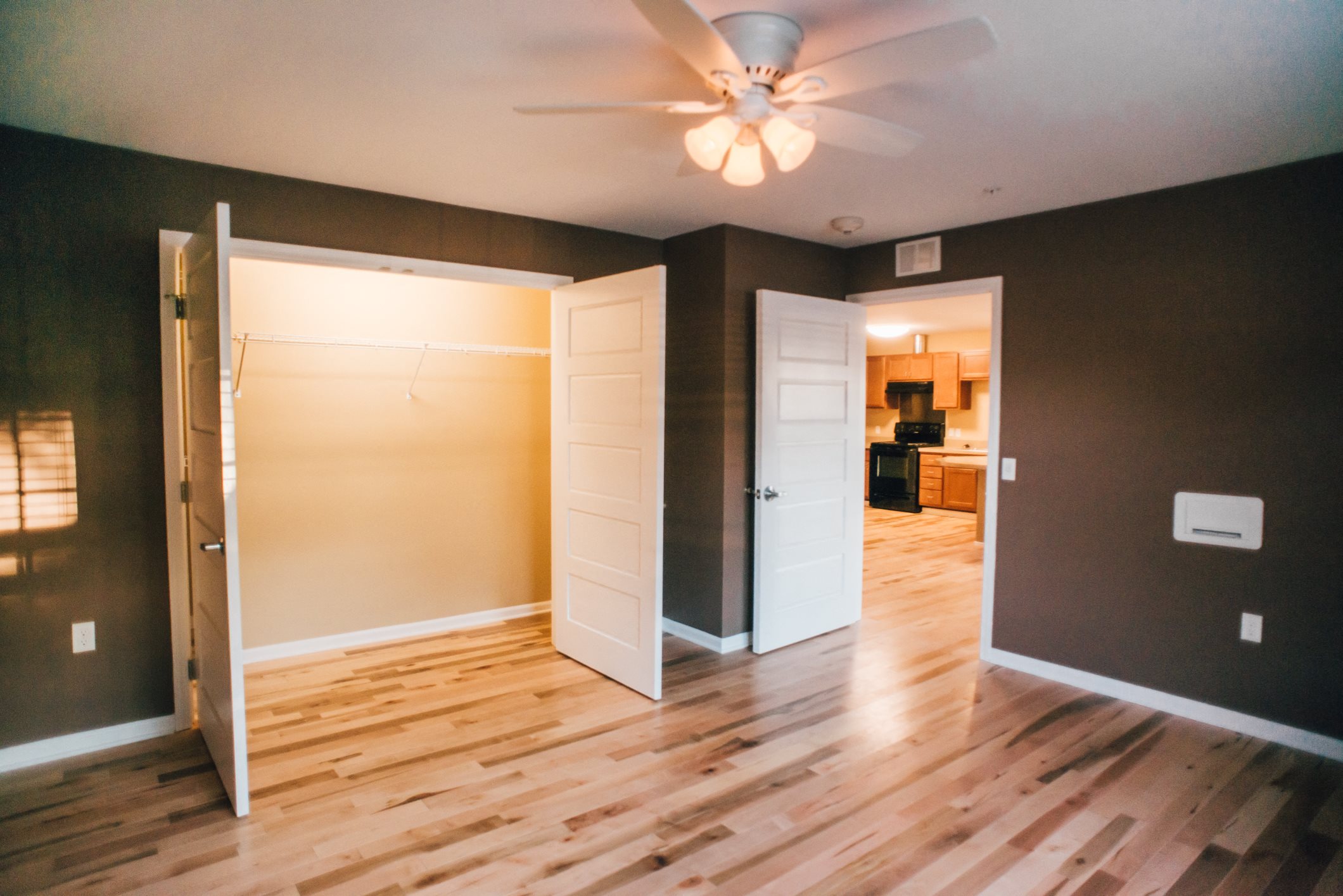 bedroom with brown walls