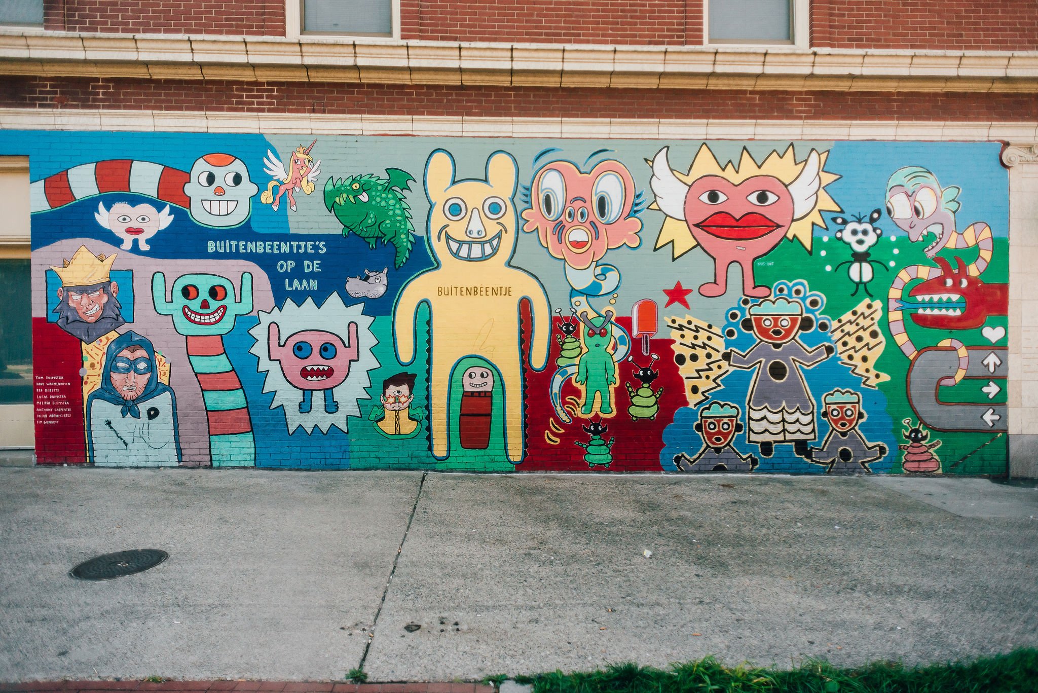 Street mural with colorful characters